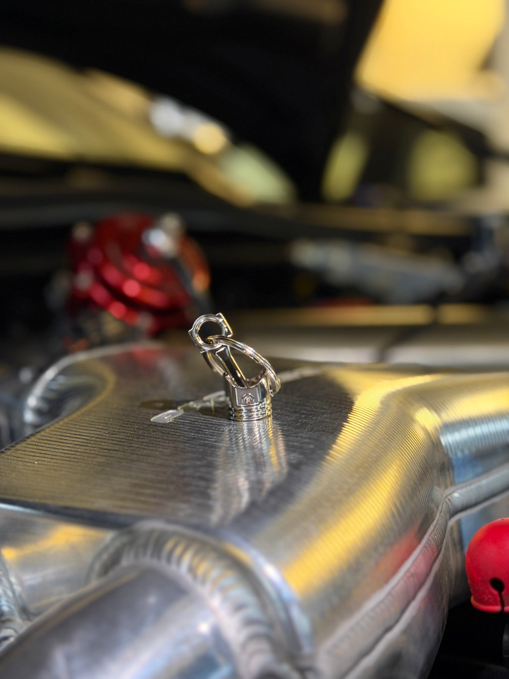 Piston key chain